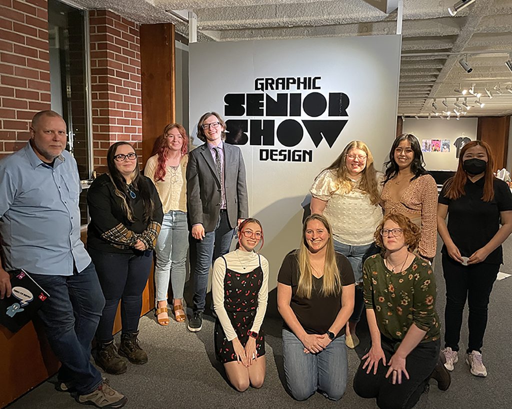 Group photo of the senior graphic design students along with Professor John Decker